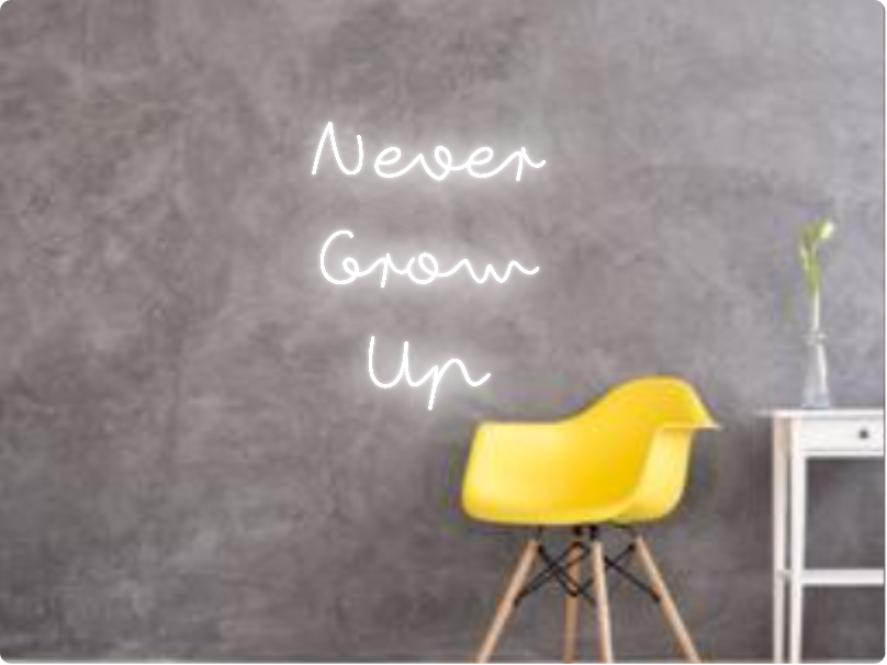 Custom text: Never 
Grow
Up
