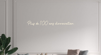 Custom text: Plus de 100 ans d