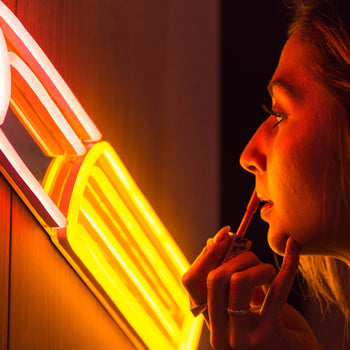 Golden Lipstick by Tom Wesselmann, neon LED sign